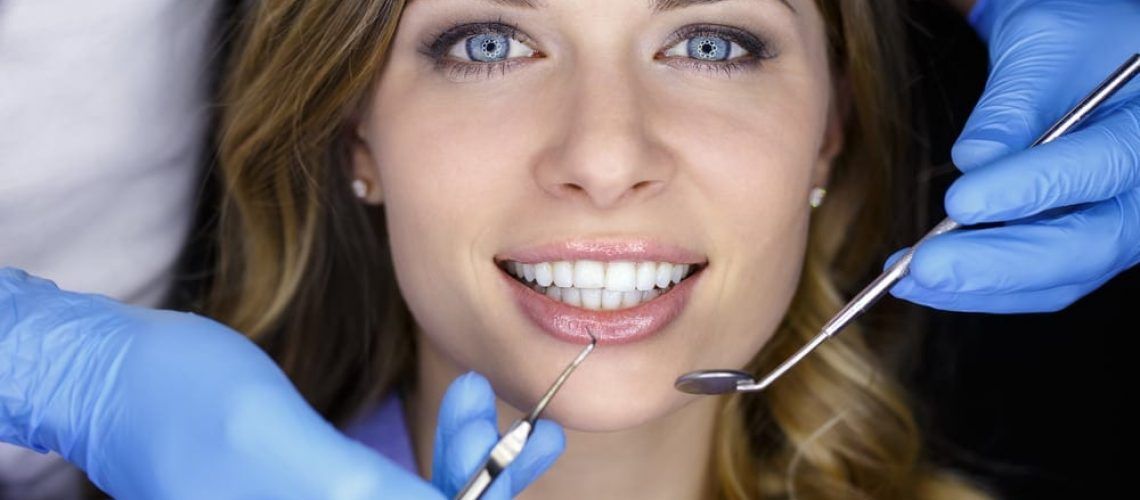 Female patient having dental checkup